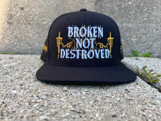 Broken Not Destroyed Snapback Hat
